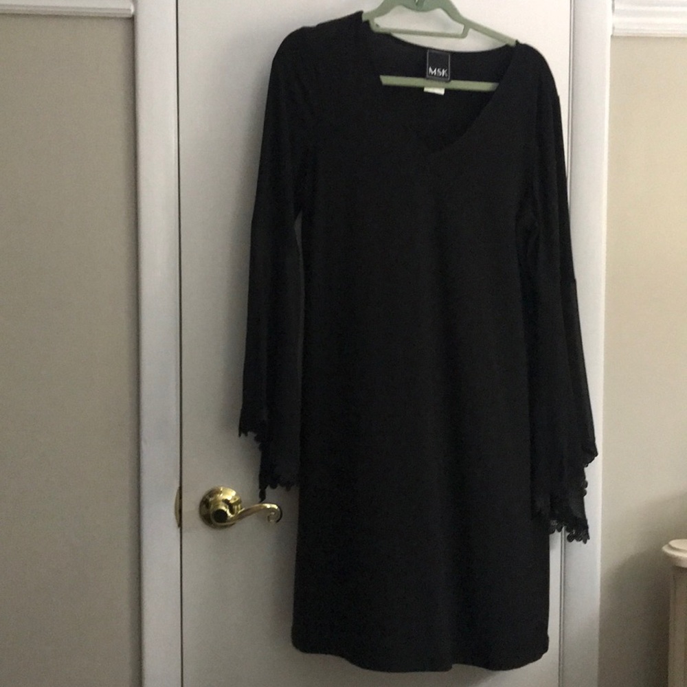 Black shift dress with decorative bell sleeves